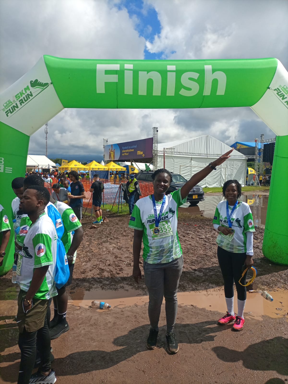 Runner celebrating at a 5km fun run finish line